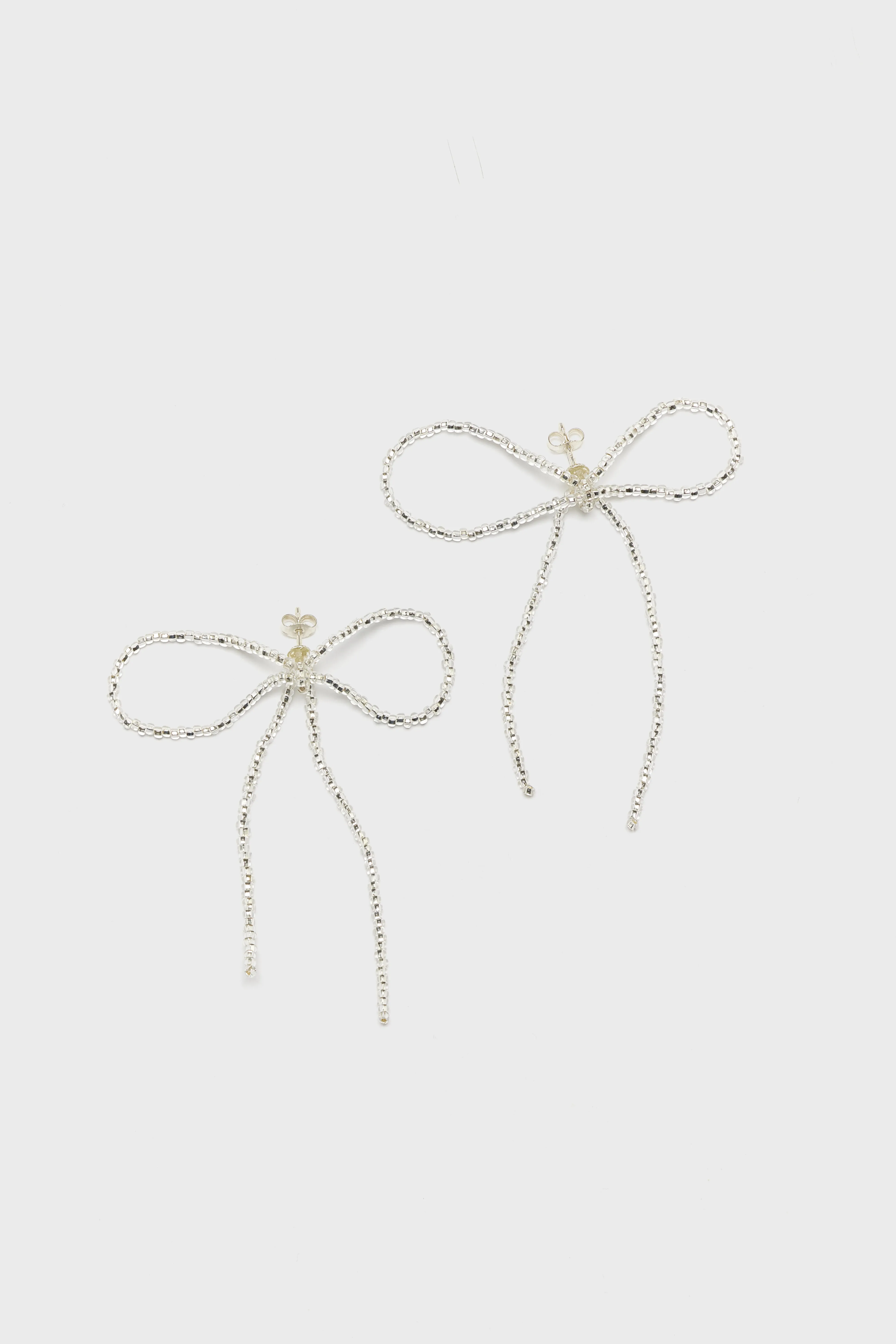 Sad Bow Ear Stick Earrings  (252 / W / SILVER) - Image 2